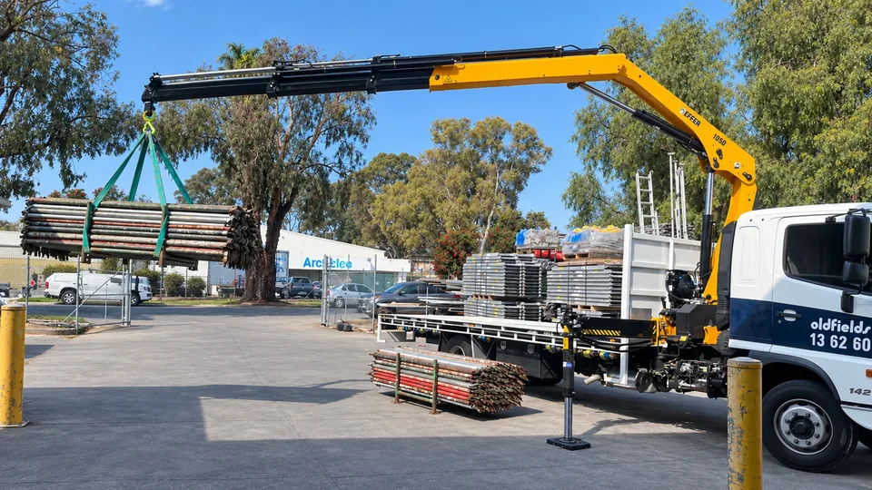 Crane truck in the yard